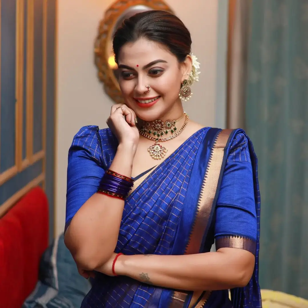 Anusree Nair Wearing Beautiful Earrings Jewellery Blue Saree